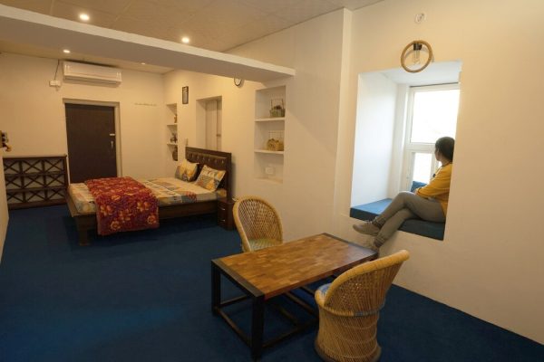 Experience the comfort of air-conditioned, spacious rooms